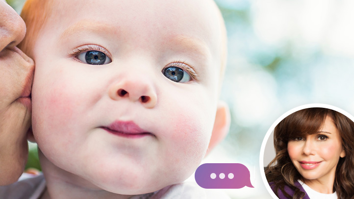 dealing with baby envy, Ask Heidi Murkoff, mom kissing baby's cheek