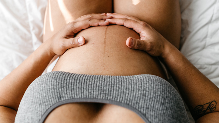 maternal health blueprint, pregnant mom holding belly