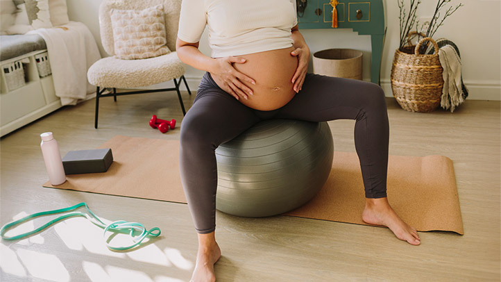 exercises to 'induce' labor, pregnant woman on birthing ball