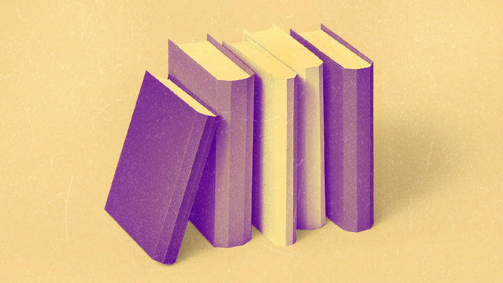 five books lined up in a row