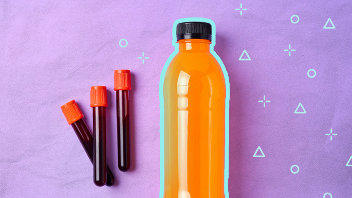 orange glucola drink and three vials of blood on a purple background