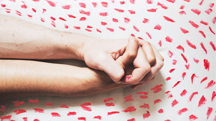 hyperprolactinemia, hands on a white background with red petals
