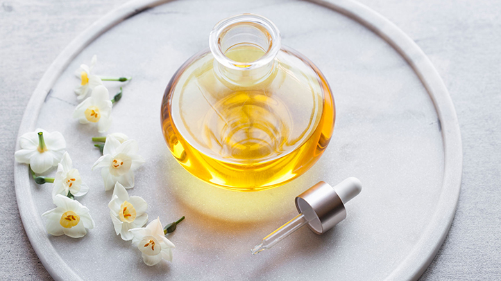 perineal massage, massage oil with flowers