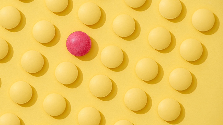 pregnancy exposure registries, yellow and red pills on a yellow background