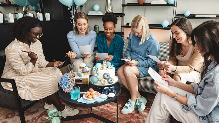 mom and friends playing printable baby shower games