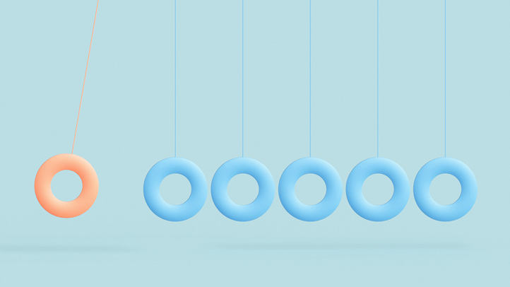 does the ring gender test really work? rings hanging on strings on blue background