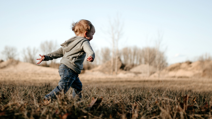 when do toddlers start running, jumping and kicking?