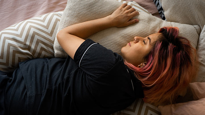 Target Stars Above Pajamas : Pregnant woman lying in bed wearing a button-down pajamas set